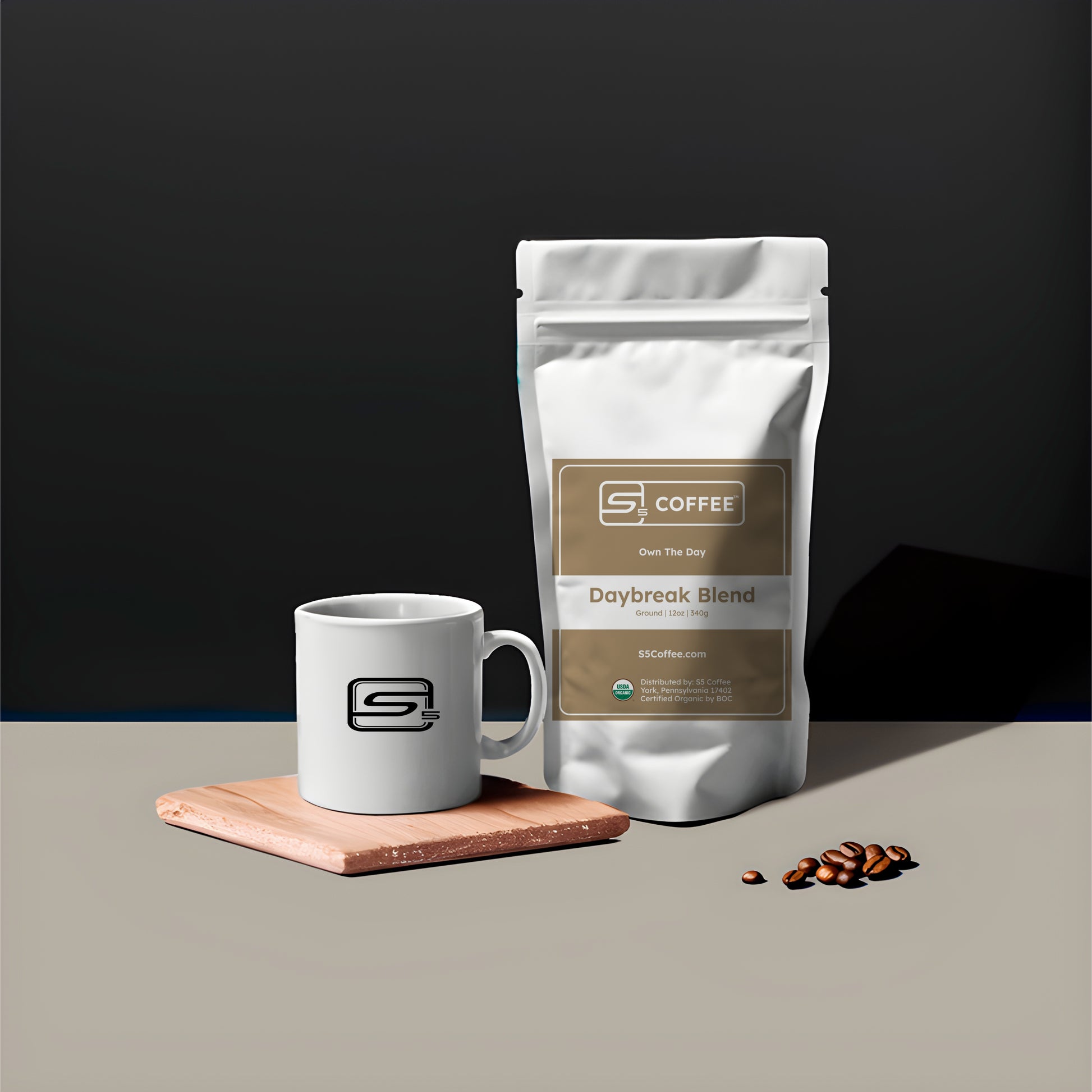 Coffee bag and mug with 'S5 Coffee' branding on a dark background