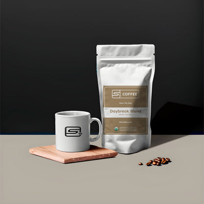 Coffee bag and mug with 'S5 Coffee' branding on a dark background