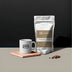 Coffee bag and mug with 'S5 Coffee' branding on a dark background